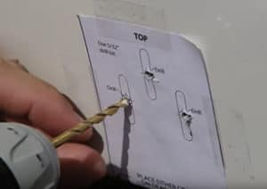 Mark the holes for the transducer mount