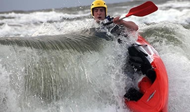 Surfing sit on top kayak