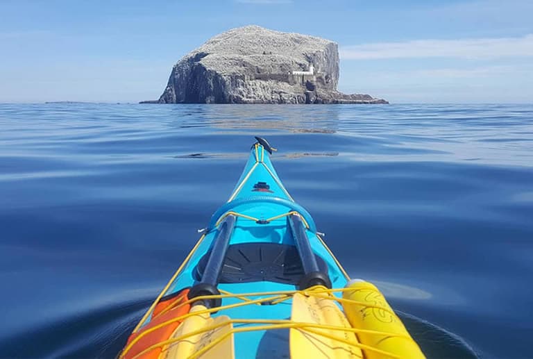 sea kayaking in ocean