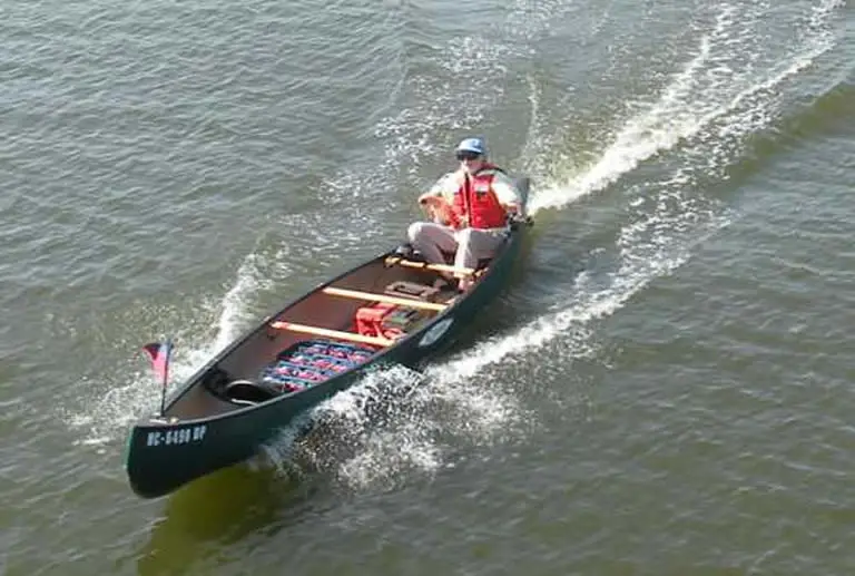 Motorized canoe on the water