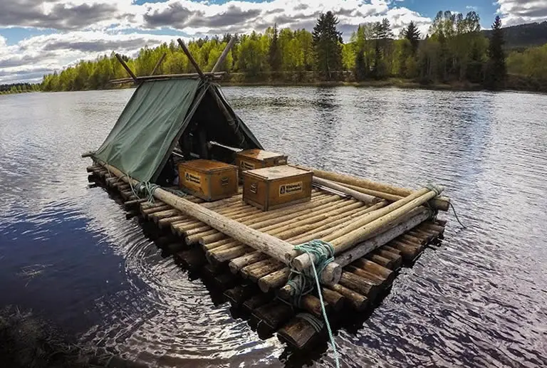 Large raft floating on river