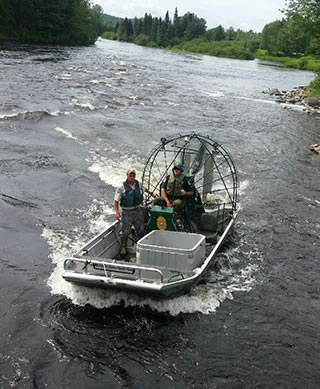 Airboat in deep water river