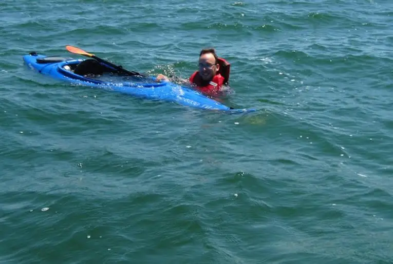 Styrofoam filled kayak floating just below waterline