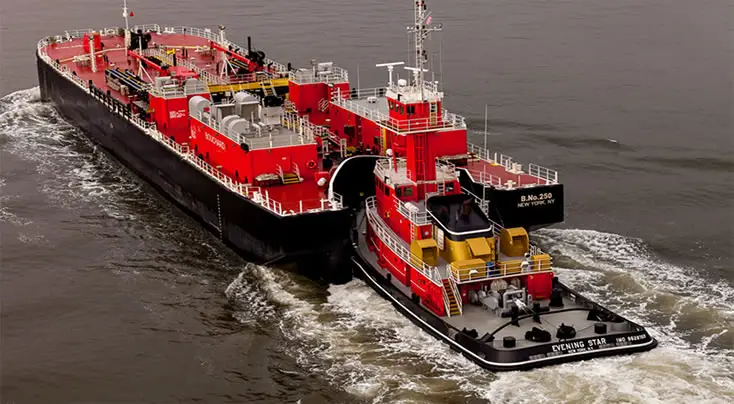 Tug barge being pushed by a tug boat