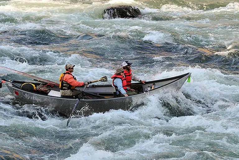 A drift boat river running