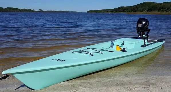 Fishing kayak with mounted outboard motor<