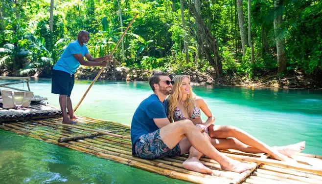 Tourists on bamboo raft tour