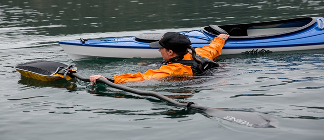 Kayak tipped paddler