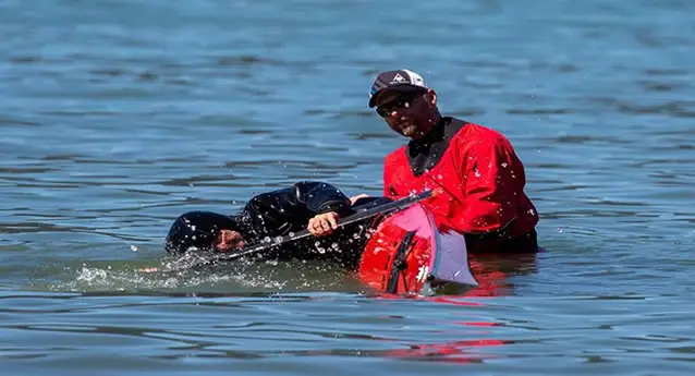 Practicing kayak rolling